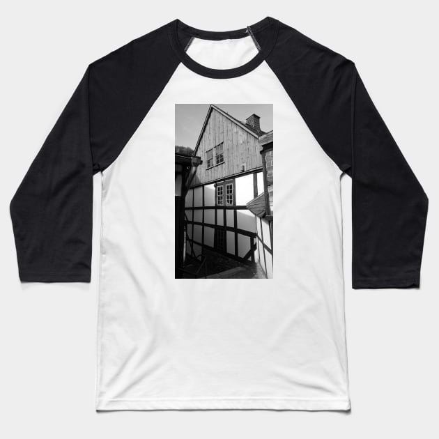 Half-timbered house in Stolberg / Harz in black and white Baseball T-Shirt by Gourmetkater